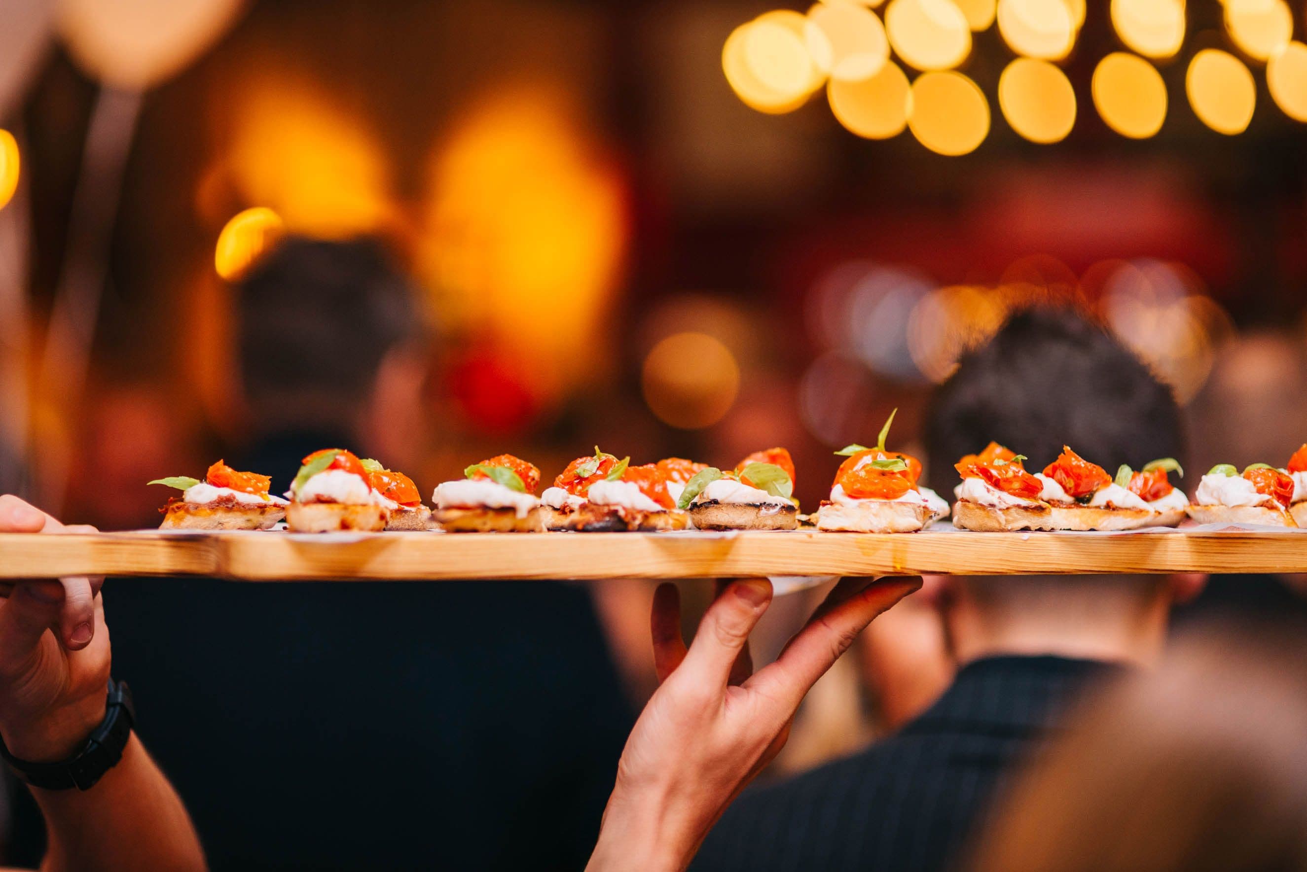 Passed appetizers at an evening event